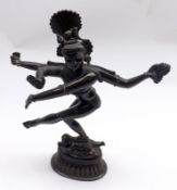 An Indian Bronze Model of Shiva in a dancing pose, 9” high