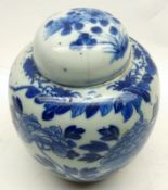 An Oriental Ginger Jar of typical form, decorated in underglaze blue with exotic bird and foliage,