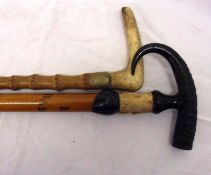 Two Vintage Horn-handled Walking Sticks, one marked “Baden Baden”, largest 32” long (2)