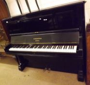 A 20th Century Ebonised Upright Piano, C Bechstein, Berlin, iron framed and overstrung, 56”wide,
