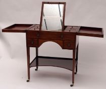 A late 18th/early 19th Century Mahogany Gents Dressing Table, the lifting lid opening to reveal a