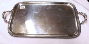 A George V Rectangular double-handled Tea Tray with gadrooned edge and plain centre 22” long, London