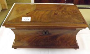 A Victorian Mahogany large Tea Caddy of sarcophagus form, the inside fitted for three
