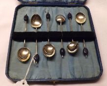 A Set of Six early 20th Century Birmingham hallmarked Bead Top Coffee Spoons, in blue fitted case
