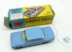 CORGI TOYS NO 229, a slightly faded boxed Light Blue Chevrolet Corvair Sedan with flat hubs, in a