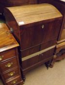 A Mahogany Former Cellaret with domed top and applied on either side with lion mask ring handles,