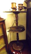 An unusual Two Tier Smokers Stand, with horse-shoe shaped shelves, the top with three bowls and a