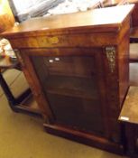 A Victorian Walnut Veneered Pier Cabinet, of typical form with inlaid floral detail, single glazed