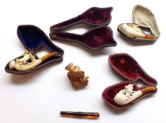 A Mixed Lot: four Vintage Meerschaum type small Pipes: three modelled with various animals, and