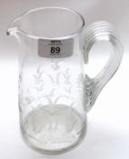 A 19th Century Clear Glass Tapering Water Jug, decorated with an etched design of ears of corn and