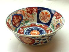 A Japanese Imari Circular Bowl, with everted rim, typically decorated in traditional colours with