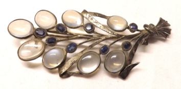 An unmarked white metal Moonstone and Sapphire set Brooch, 3” long