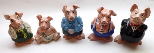 A Graduated Set of five Wade Nat West Piggy Banks, typically decorated, largest one is 7 ½” high