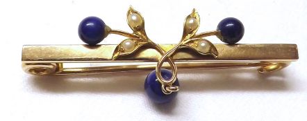 An unmarked yellow metal Bar Brooch featuring a Seed Pearl and Lapis Lazuli mounted sprig with drop,