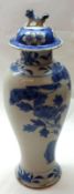 A Chinese Covered Baluster Vase, decorated in underglaze blue with birds and foliage, base with 4