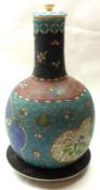 A Chinese Pottery Covered Vase on Stand, painted in colours with rosettes on a predominantly pale