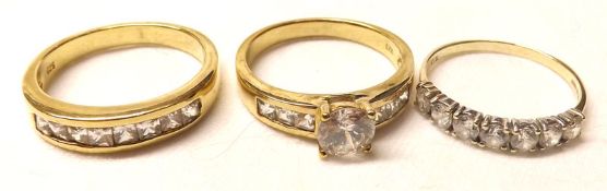 A hallmarked 9ct Gold seven Cubic Zirconia Half-Hoop Ring; together with two further gilt, white