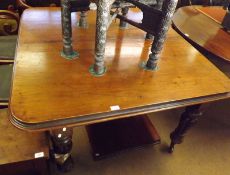 A Victorian Mahogany Pull-Out Extending Dining Table with moulded edge, plain frieze and raised on