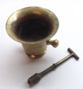 A 19th Century Brass Mortar, double-handled of typical tapering form with a probably later Pestle,