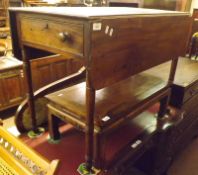 A Victorian Mahogany Pembroke Drop Leaf Table with single drawer, raised on turned legs and brass