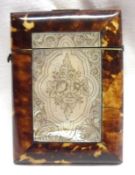 A Victorian Tortoiseshell Card Case of typical rectangular hinged form, decorated with central