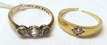 A precious metal Ring set with a single small Old Cut Diamond in gypsy style (worn/cut); together