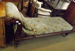 A Victorian Mahogany Chaise Longue, swept moulded and scrolled back over a moulded apron and