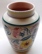 A large Poole Pottery Vase, typically decorated with coloured sprays on a pale background, impressed