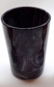 A Victorian Purple Slag Glass Beaker of round tapering form, 4” high
