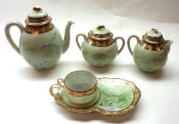 An Oriental Eggshell Porcelain Tea Service, comprising a Teapot, a two-handled Covered Sugar Bowl