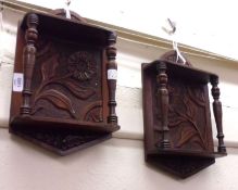 A pair of probably composite Carved Oak Wall Brackets, each fitted with two open shelves joined by