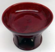 A Royal Doulton Flambé round three-legged Pedestal Bowl on round base, 8 ½” diameter (chip to top