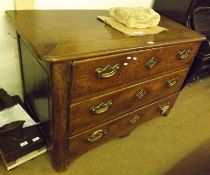 An 18th Century Dutch Oak Three Drawer Chest with brass swan neck handles, 48” wide