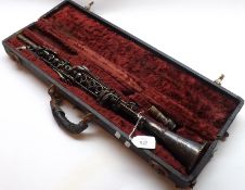 An American Standard white metal Clarinet, with mouthpiece, made by The H.M. White Company Cleveland