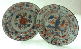 A pair of 18th Century Chinese Circular Plates, typically painted in iron red and underglaze blue