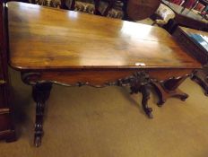 A William IV or early Victorian Rosewood Two-Drawer Library Table, raised on two pedestals with