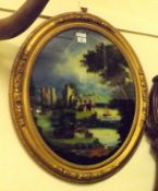 A late 19th Century Oval Reverse Painted on Glass Picture, river scene with ruins, in a gilt painted