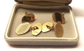 A pair of hallmarked 9ct Gold Shaped Oval Cufflinks with chain dividers; together with a further