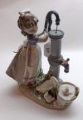 A large Lladro Figure Group of girl at water-pump with attendant ducks, marked Daisa 1985, further