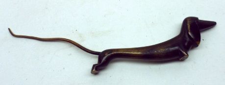 A small Austrian Bronze Model of a Dachshund, marked for retailer Rena Rosenthal, 7 ½” long