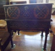 An 18th/19th Century and later Oak Bible Box on Stand, the later carved top and front with moulded