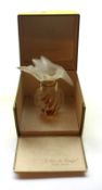 A Lalique for Nina Ricci “L’air de Temps” Perfume Bottle with bird-shaped frosted glass stopper (