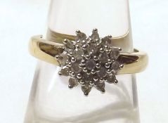 A hallmarked 9ct Gold Diamond Cluster Ring