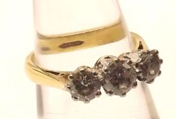 A hallmarked 18ct Gold three Brilliant Cut Diamond Ring, approx .5ct total