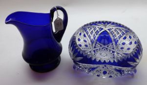 A 19th Century Bristol Blue Glass single-handled Jug on pedestal base; together with a Bohemian