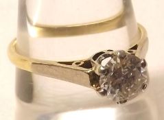 A high grade precious metal Solitaire Diamond Ring, brilliant cut, approximately .6ct