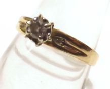 A mid-grade precious small Solitaire Diamond Ring, Brilliant Cut, stamped “14K”
