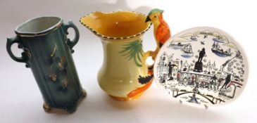 A Burleigh Ware Art Deco period Jug, the handle formed as a parrot and decorated in naturalistic