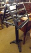 A late 19th/early 20th Century Ebonised Music Stand of typical form, with wedge-shaped slatted