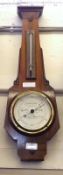 A Short & Mason early 20th Century Mahogany and Ebonised Wheel Barometer with double scale